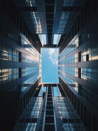 Low angle view of modern buildings against sky