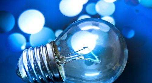 Close-up of illuminated light bulb
