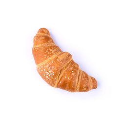 High angle view of bread against white background