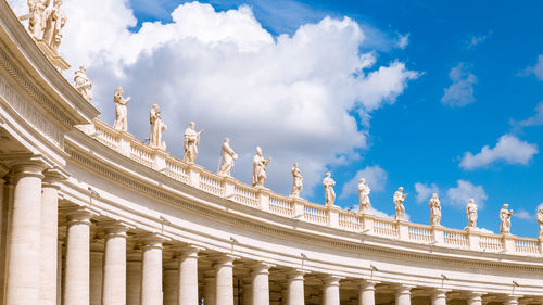 Low angle view of historical building against cloudy sky