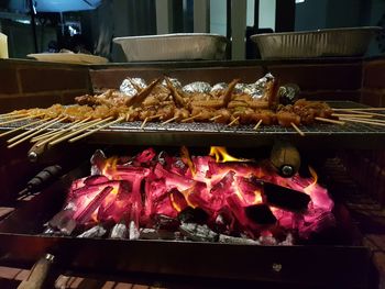 Close-up of meat on barbecue grill