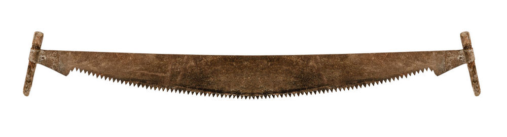 Close-up of clothes hanging on wood against white background