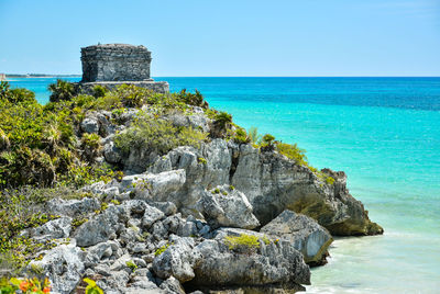 Scenic view of sea against clear blue sky