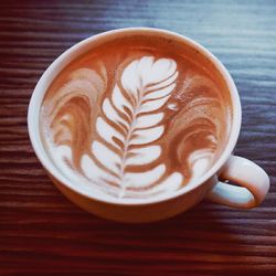 Close-up of cappuccino on table