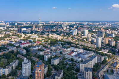 Aerial photography of residential quarters of kyiv with parks and a television tower, aerial view.