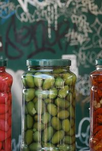 Close-up of olives in jar