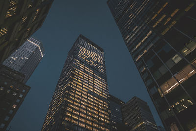 Low angle view of modern buildings against sky