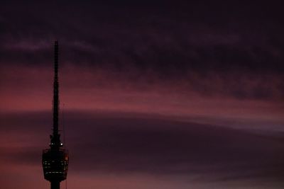 Tower against sky at dusk