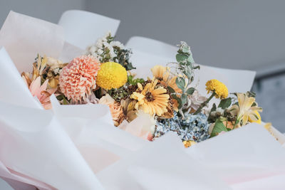 High angle view of white flowers on table