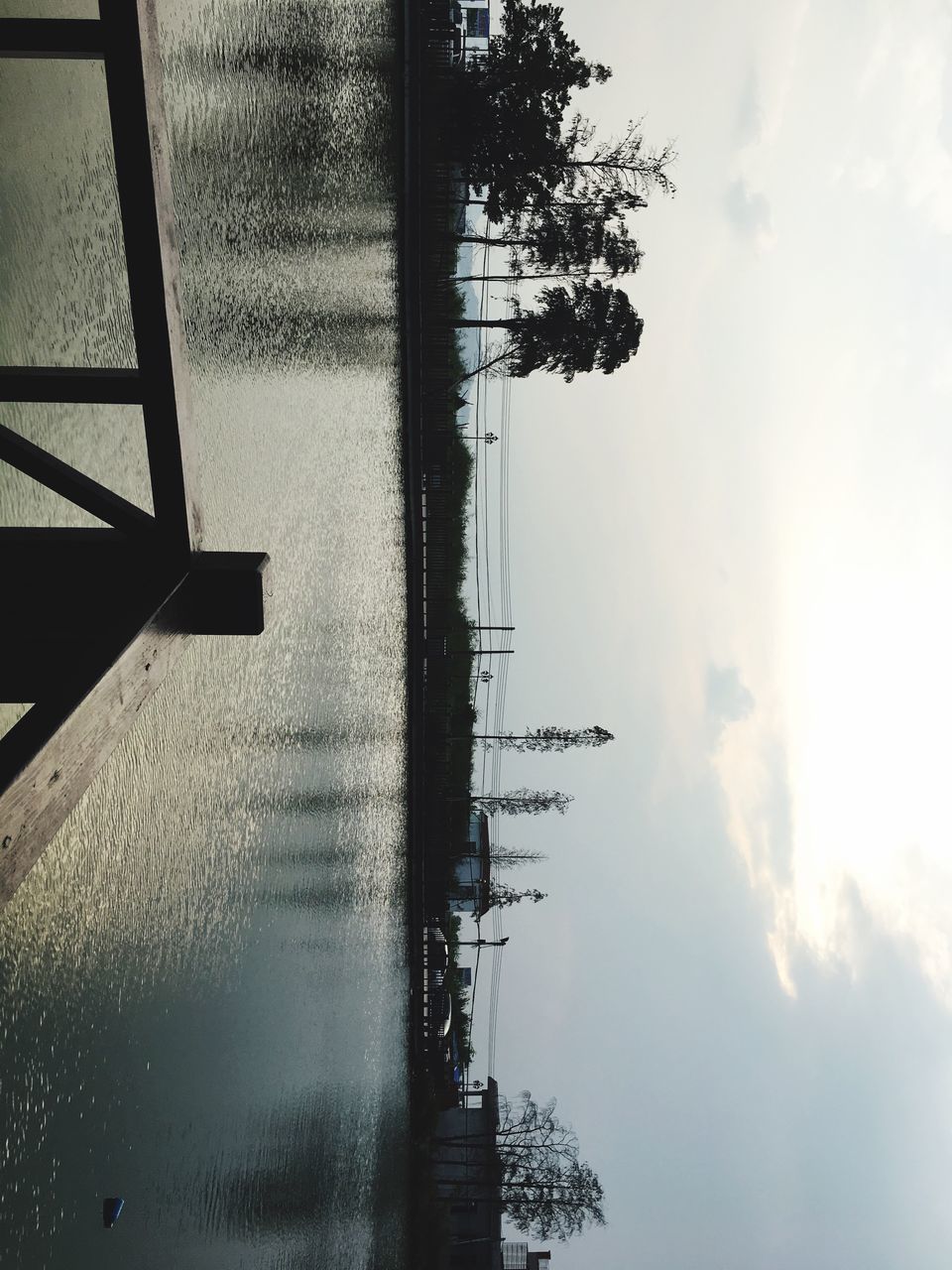 water, sky, lake, tree, cloud, nautical vessel, rippled, waterfront, tranquility, tranquil scene, river, pier, scenics, cloud - sky, day, nature, calm, outdoors, the way forward, no people, riverbank, water surface, surface level