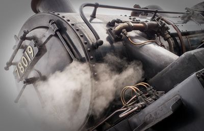 Low angle view of steam train