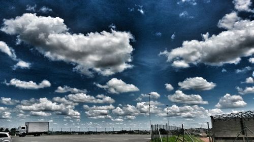 Panoramic view of harbor against sky