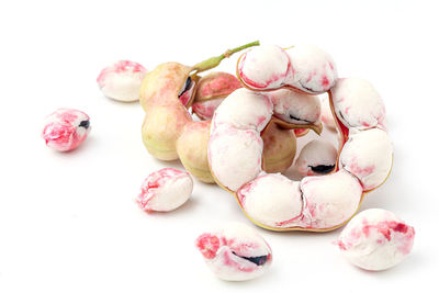 High angle view of fruits against white background