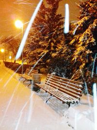 High angle view of empty bench in park