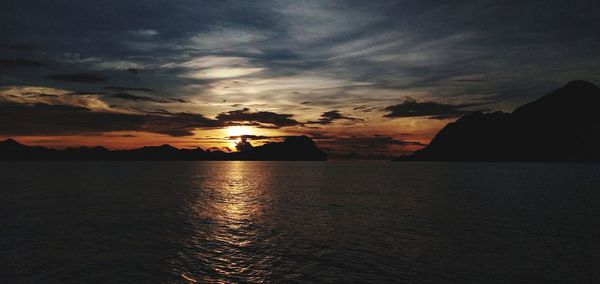 Scenic view of sea against sky during sunset