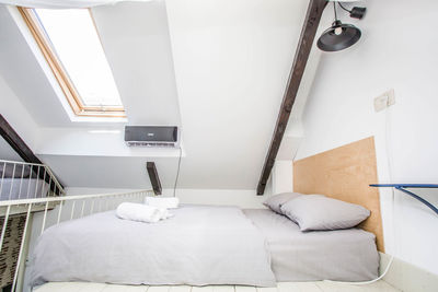 High angle view of white curtain on bed at home