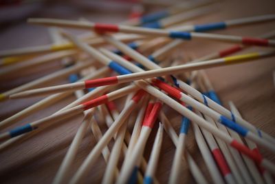 Close-up of multi colored pencils on table