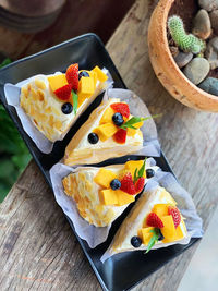 Close-up of cake served on table