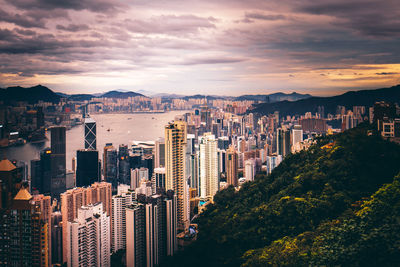 High angle view of buildings in city against sky during sunset