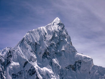 Scenic view of snowcapped mountain against sky