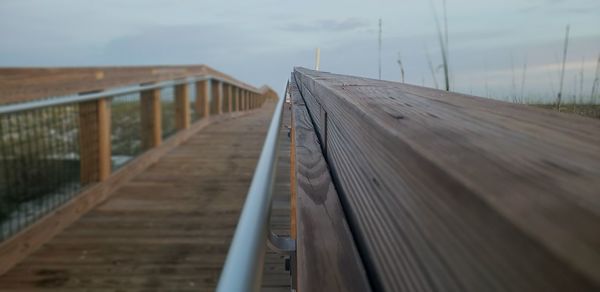 View of footbridge against sky