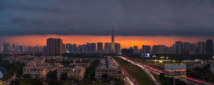 High angle view of city at sunset