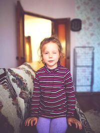 Portrait of cute smiling girl at home