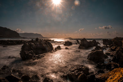 Scenic view of sea against sky during sunset