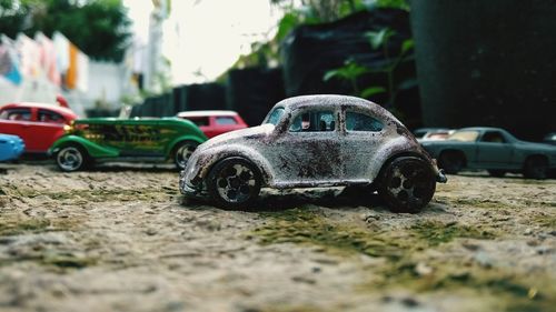 Close-up of toy car on street