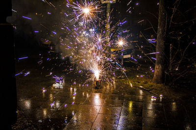 Firework display at night