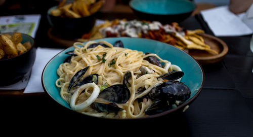 Close-up of noodles in bowl on table