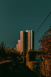 Modern buildings against clear sky