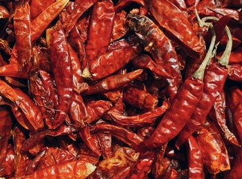 Full frame shot of red chili peppers for sale in market