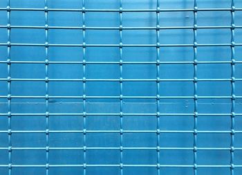 Full frame shot of blue metal grate