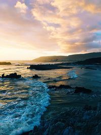 Scenic view of sea against dramatic sky