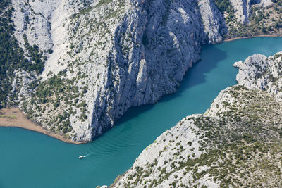 High angle view of rocks by sea