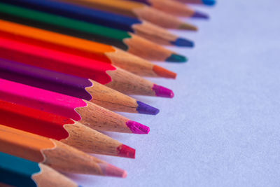 Close-up of colored pencils on table