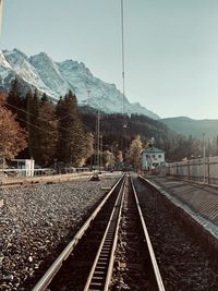 Railroad tracks in mountains against clear sky at zugspitze germany