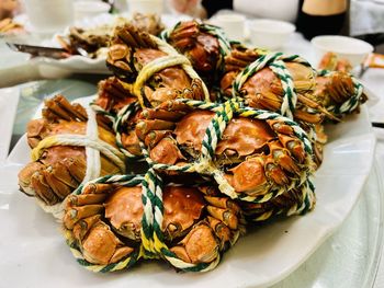 Close-up of hairy crabs on plate