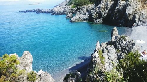 Scenic view of sea against blue sky