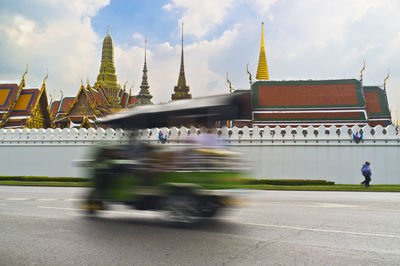 Blurred motion of cathedral against cloudy sky