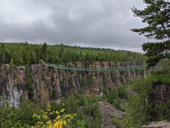 Panoramic shot of bridge on land against sky