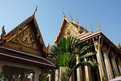 Low angle view of temple against building