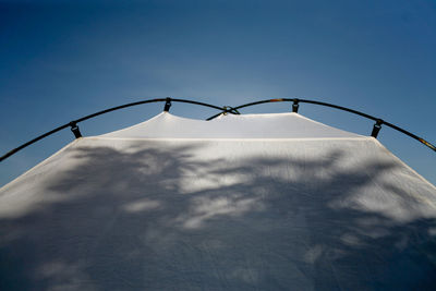 Low angle view of street light against sky