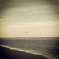 Scenic view of sea against sky at sunset