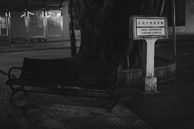 Empty benches with text on bench