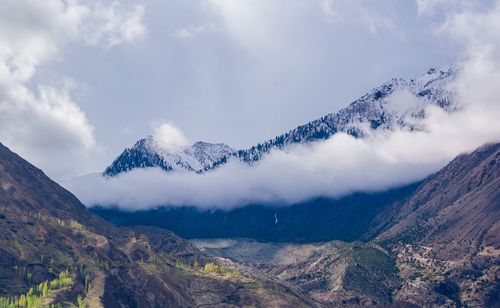 Scenic view of mountains against sky during winter