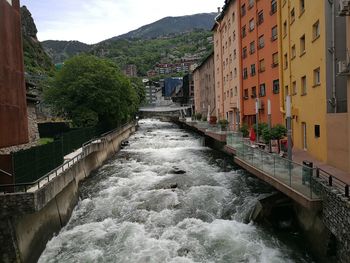 View of canal with buildings in background