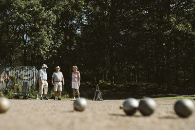 People playing pétanque