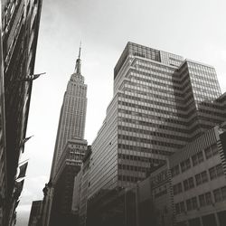 Low angle view of modern buildings against sky